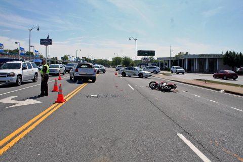 Clarksville Police work a motorcycle accident Sunday afternoon at Riverside Drive and North Second Street. (Bill Van Beber III, CPD)