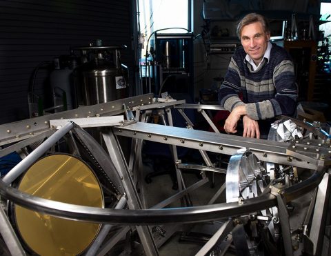 Al Kogut, an astrophysicist at NASA Goddard, poses with one of the millimeter-wave telescopes for the Primordial Inflation Polarization Explorer (PIPER) balloon mission. (NASA's Goddard Space Flight Center/Bill Hryby) Al Kogut, an astrophysicist at NASA Goddard, poses with one of the millimeter-wave telescopes for the Primordial Inflation Polarization Explorer (PIPER) balloon mission. (NASA's Goddard Space Flight Center/Bill Hryby)