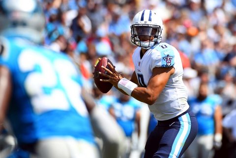 Tennessee Titans quarterback Marcus Mariota (8) drops back to pass during the first half against the Carolina Panthers at Nissan Stadium. (Christopher Hanewinckel-USA TODAY Sports)