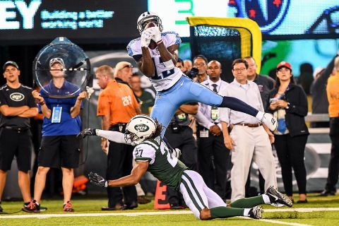 Tennessee Titans wide receiver Taywan Taylor (13) catches a pass defended by New York Jets cornerback Darryl Roberts (27) during the third quarter at MetLife Stadium. (Dennis Schneidler-USA TODAY Sports)