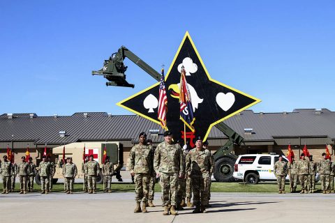 (Center left to right) Command Sgt. Maj. Anthony B. McAdoo, incoming command sergeant major, Col. Stanley J. Sliwinski, commander, and Command Sgt. Maj. Michael J. Perry III, outgoing command sergeant major, all with the 101st Airborne Division (Air Assault) Sustainment Brigade, 101st Abn. Div., face the audience after transfer the responsibility of the brigade from one senior enlisted adviser to the other, Sept. 7, 2017, during a ceremony on Fort Campbell, Kentucky. (Sgt. Neysa Canfield/101st SBDE Public Affairs) 