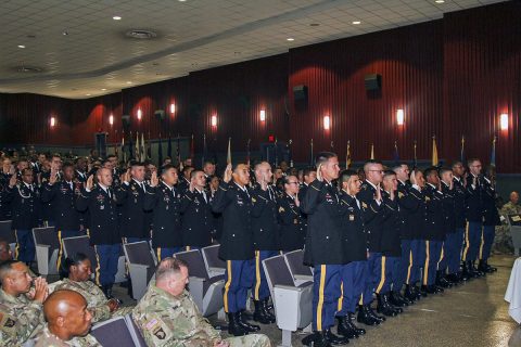 One hundred and fifteen noncommissioned officers from units around Fort Campbell, Ky., recite the Charge to the Newly Promoted Noncommissioned Officer during an NCO Induction ceremony August 29, 2017. (Pfc. Alexes Anderson/ 101st Airborne Division (Air Assault) Sustainment Brigade Public Affairs Office) 