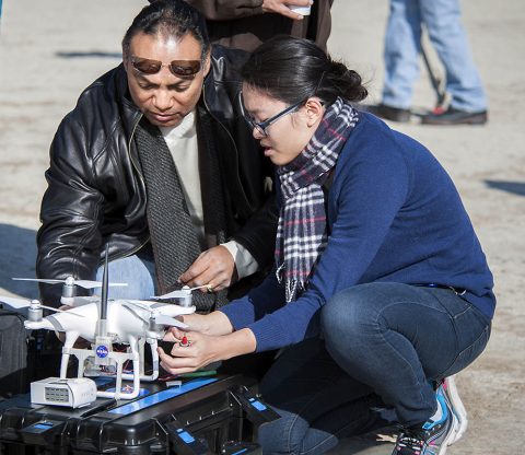 Ricardo Arteaga and Hong Truong resolve a transmission issue with a drone during testing of technology recently used in Texas for search and rescue efforts and accessing damage caused by Hurricane Harvey. (NASA Photo / Lauren Hughes)