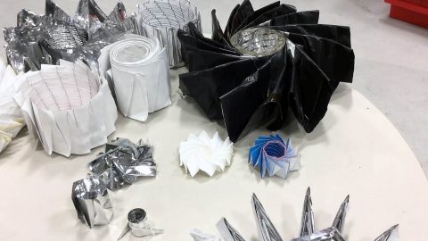 Some examples of origami designs at JPL. Engineers are exploring this ancient art form to create folding spacecraft. (NASA/JPL-Caltech)