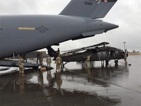 Tennessee Army National Guard Soldiers of the 1-230th Aviation Regiment load a UH-60L Blackhawk helicopter on to a New York Air National Guard C-17 Globemaster III to assist in recovery efforts in the US Virgin Islands following Hurricane Irma.