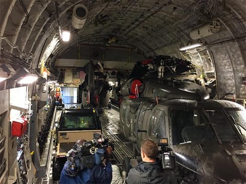 A Tennessee Army National Guard UH-60L Blackhawk helicopter becomes the cargo for a New York Air National Guard C-17 Globemaster III.  The helicopters are headed to the US Virgin Islands to assist in recovery operations following Hurricane Irma.