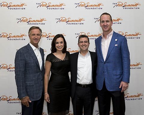 Tennessee Gov. Bill Haslam, Dr. Roberto Fernandez, medical director of The Pat Summitt Clinic at The University of Tennessee Medical Center, and his wife, Dr. Denia Ramirez, and Peyton Manning.