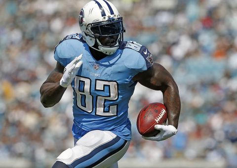 Tennessee Titans running back Derrick Henry (22) runs outside for a touchdown during the second half of a football game against the Jacksonville Jaguars at EverBank Field. (Reinhold Matay-USA TODAY Sports)