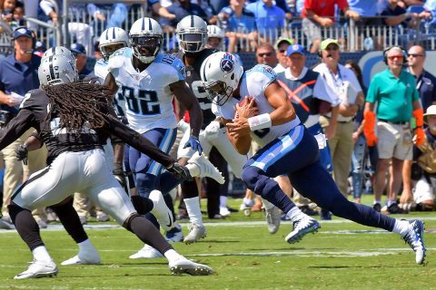 Tennessee Titans quarterback Marcus Mariota (8) rushes against the Oakland Raiders during the first half at Nissan Stadium. (Jim Brown-USA TODAY Sports)