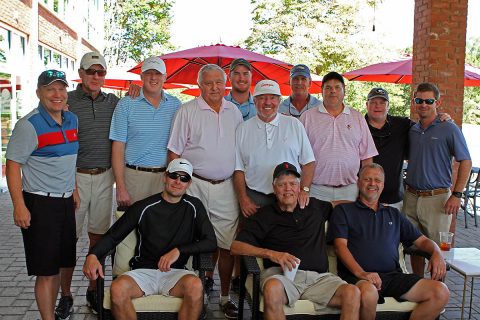 The Georgia team gathered around team captain Wayne Pace in the Georgia hat.