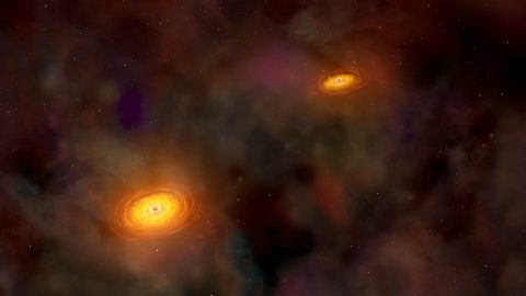 Illustration of supermassive black hole pair. (NASA/CXC/A.Hobart)