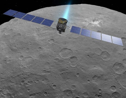 This artist concept shows NASA's Dawn spacecraft above dwarf planet Ceres, as seen in images from the mission. (NASA/JPL-Caltech)