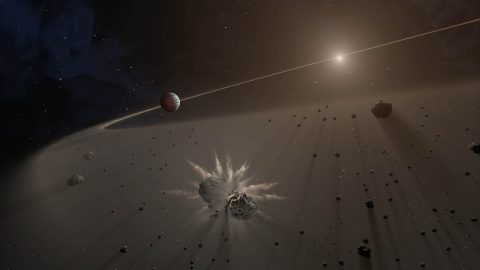 This artist's rendering shows a large exoplanet causing small bodies to collide in a disk of dust. (NASA/JPL-Caltech) This artist's rendering shows a large exoplanet causing small bodies to collide in a disk of dust. (NASA/JPL-Caltech)