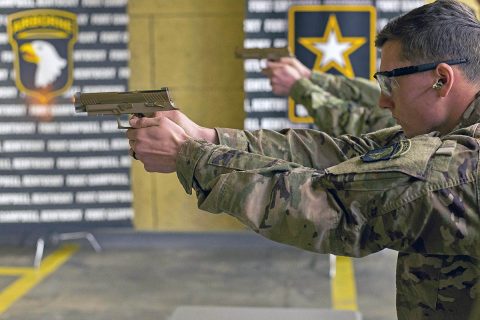 A Soldier with C Company, 1st Battalion, 506th Infantry Regiment, 1st Brigade Combat Team, 101st Airborne Division (Air Assault) fires the new M17 or Modular Handgun System at the 5th Special Forces Group (Airborne) indoor range, November 28th. The 101st ABN DIV (AASLT), the word’s only air assault division, is the first unit in the Army to field the service’s new handgun. (Sgt. Samantha Stoffregen, 101st Airborne Division (Air Assault) Public Affairs) 