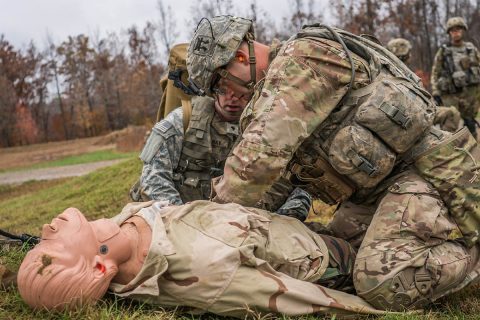 Spc. Brian M. Milliman of Lansing, N.Y., an infantrymen with Company C, 3rd Battalion, 187th Infantry Regiment, 3rd Brigade Combat Team “Rakkasans”, 101st Airborne Division (Air Assault) performs aid on a friendly casualty as part of a squad live-fire range held at Fort Campbell, Ky., Nov. 7. The squad live-fire was a chance for the soldiers to hone their infantry skills. (Spc. Patrick Kirby, 40th Public Affairs Detachment) 