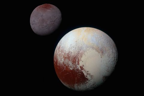 Composite, enhanced-color image of Pluto (lower right) and its largest moon Charon (upper left) taken by NASA’s New Horizons spacecraft on July 14, 2015. Pluto and Charon are shown with approximately correct relative sizes, but their true separation is not to scale. (NASA/JHUAPL/SwRI)