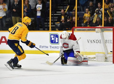 Nashville Predators center Kyle Turris (8) scores past Montreal Canadiens goalie Antti Niemi (37) for the only goal during the shootout at Bridgestone Arena. (Steve Roberts-USA TODAY Sports)