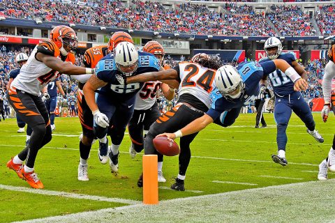 Tennessee Titans quarterback Marcus Mariota (8) is knocked out of bounds by Cincinnati Bengals cornerback Adam Jones (24) as he dives for the goal line during the first half at Nissan Stadium on November 12th, 2017. (Jim Brown-USA TODAY Sports)