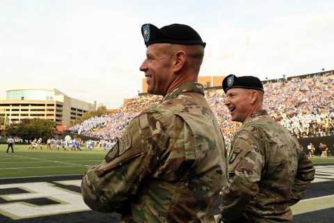 Lt. Col. Hugh Sollom, and Command Sgt. Maj. Jonathan Simmons, commander and command sergeant major, respectively, of the 2nd Battalion, 32nd Field Artillery Regiment, 101st Airborne Division Artillery, take in the University of Kentucky vs. Vanderbilt University football game, at VU, Nov. 11. Vanderbilt opened their stadium for active duty soldiers and their family members in recognition of Veterans Day. (Staff Sgt. Todd Pouliot, 40th Public Affairs Detachment)