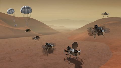 Dragonfly is a dual-quadcopter lander that would take advantage of the environment on Titan to fly to multiple locations, some hundreds of miles apart, to sample materials and determine surface composition to investigate Titan's organic chemistry and habitability, monitor atmospheric and surface conditions, image landforms to investigate geological processes, and perform seismic studies. (NASA)