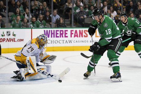 Nashville Predators goalie Juuse Saros (74) stops a shot by Dallas Stars center Radek Faksa (12) during the second period at the American Airlines Center. (Jerome Miron-USA TODAY Sports)