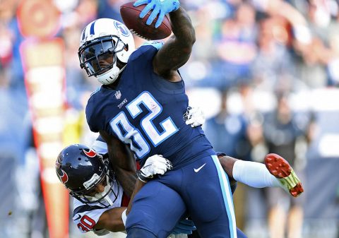 Tennessee Titans tight end Delanie Walker (82) carries Houston Texans cornerback Kevin Johnson (30) into the end zone for a touchdown during the second half at Nissan Stadium on December 3rd, 2017. (Christopher Hanewinckel-USA TODAY Sports)