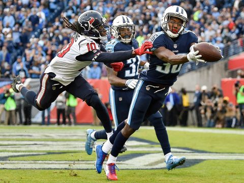 Tennessee Titans cornerback LeShaun Sims (36) intercepts a pass intended for Texans wide receiver DeAndre Hopkins (10) during the second half at Nissan Stadium. (Andrew Nelles/The Tennessean via USA TODAY Sports)