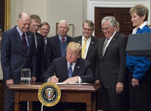 Representatives of Congress and the National Space Council joined President Donald J. Trump, Apollo astronaut Jack Schmitt and current NASA astronaut Peggy Whitson Monday, Dec. 11, 2017, for the president’s signing of Space Policy Directive 1, a change in national space policy that provides for a U.S.-led, integrated program with private sector partners for a human return to the Moon, followed by missions to Mars and beyond. (NASA/Aubrey Gemignani)