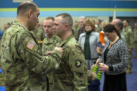 Maj. Gen. Andrew Poppas, 101st Airborne Division (Air Assault) commanding general, pins the Soldier’s Medal on Staff Sgt. Nicholas Davis, C Battery, 1st Battalion, 320th Field Artillery Regiment, 101st Abn. Div. (AASLT) Artillery cannon crew member and section chief, during a ceremony held at Fort Campbell, Jan. 22. Davis, an Ellijay, Georgia, native and seven-year combat veteran with deployments to Iraq and Afghanistan, received the award for heroism and his lifesaving actions when he rescued a couple from a burning vehicle, June 9, 2017. 