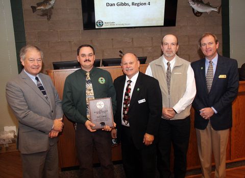 Dan Gibbs (second from left) holds his award for being named Tennessee Wildlife Resources Agency Biologist of the Year for 2017. Pictured (from left) are Ed Carter (TWRA Executive Director), Gibbs, Mark Gudlin (TWRA Wildlife and Forestry Division Chief), John Mike (Region IV Wildlife Manager) Jeff Cook (Tennessee Fish and Wildlife Commission Vice Chairman).