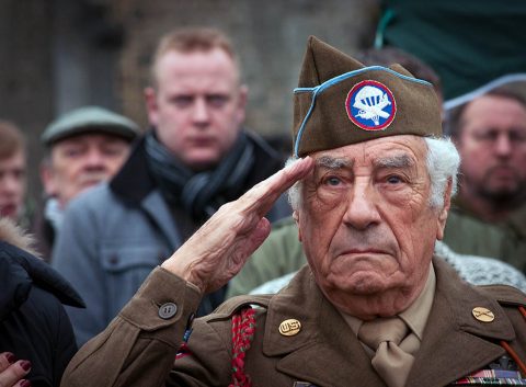 WWII Battle of the Bulge veteran Vincent Speranza salutes the U.S. flag at the 17th Airborne Division Memorial in Bertogne, Belgium, during a ceremony to commemorate the 71st anniversary of the Battle of the Bulge, Dec. 13, 2015. The text on the Monument reads as follows: “In proud remembrance of the men of the 17th Airborne Division who fought in this area during the Battle of the Bulge in January 1945. They fought that we might be free.” (U.S. Army photo by Staff Sgt. Bernardo Fuller/Released) 