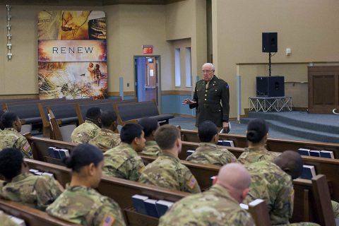 Dr. Dick Stennebaken, retired Army Chaplain (Col.), weaves a tale about being a chaplain during the Nuremburg trails, to unit ministry teams in attendance at Liberty Chapel, Fort Campbell, Kentucky, 19 Jan. The skit was intended to feel very real, with the majority of attendees not knowing it’s just acting. (Sgt. Samantha Stoffregen, U.S. Army) 