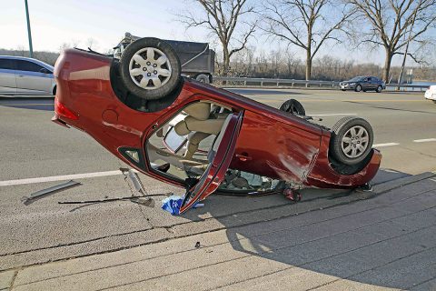 2008 Hyundai hits a light pole on Riverside Drive causing it to flip over and land on it's roof. (Jim Knoll, CPD)