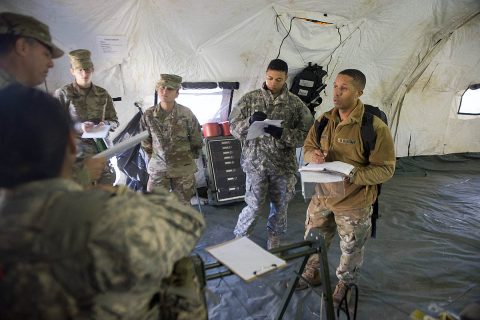 A team of Soldiers with the 101st Airborne Division (Air Assault), 86th Combat Aviation Support Hospital and Blanchfield Army Community Hospital conduct an interview with a 3rd Brigade Combat Team medic as part of a field exercise portion during a preventative medicine course October 26, 2017. Three teams were given varying scenarios in which they had to identify the health issue, conduct interviews and perform soil, water, or air tests. (Sgt. Samantha Stoffregen, 101st Airborne Division (Air Assault) public affairs) 