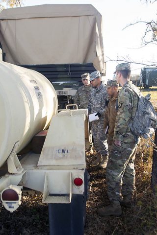 A team of Soldiers with the 101st Airborne Division (Air Assault), 86th Combat Aviation Support Hospital and Blanchfield Army Community Hospital inspect a water buffalo as part of a field exercise portion during a preventative medicine course October 26, 2017. The course focused on expanding the skillset of medics and reviewed topics for brigade preventive medicine teams. (Sgt. Samantha Stoffregen, 101st Airborne Division (Air Assault) public affairs) 