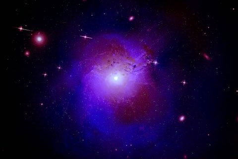 Composite image of the Perseus galaxy cluster using data from NASA’s Chandra X-ray Observatory, ESA’s XMM-Newton and Hitomi, a Japanese-led X-ray telescope. (X-ray: NASA/CXO/Fabian et al.; Radio: Gendron-Marsolais et al.; NRAO/AUI/NSF Optical: NASA, SDSS)