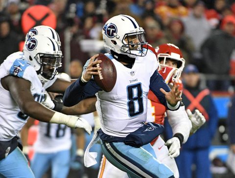 Tennessee Titans quarterback Marcus Mariota (8) throws a pass against the Kansas City Chiefs during the fourth quarter in the AFC Wild Card playoff football game at Arrowhead Stadium. (Denny Medley-USA TODAY Sports)