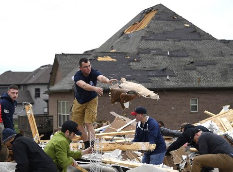 People work to clear debris after a fierce storm hit Saturday night in the Farmington subdivision. (Lacy Atkins/The Tennessean via USA TODAY NETWORK) People work to clear debris after a fierce storm hit Saturday night in the Farmington subdivision. (Lacy Atkins/The Tennessean via USA TODAY NETWORK)