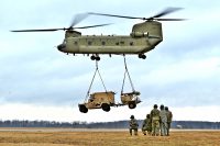 Soldiers of 3rd Battalion, 320th Field Artillery Regiment, 101st Airborne Division Artillery Brigade “Red Knights”, began moving artillery assets to the training area at Fort Campbell, Kentucky, January 22, 2018. The air assault training is the lead up to platoon level artillery live-fire evaluations over the next three weeks. Six artillery platoons from the Red Knights are slated to participate in the evaluation, which will validate the unit’s readiness to fight. (Staff Sgt. Todd Pouliot, 40th Public Affairs Detachment)