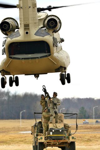 Soldiers of 3rd Battalion, 320th Field Artillery Regiment, 101st Airborne Division Artillery Brigade "Red Knights", began moving artillery assets to the training area at Fort Campbell, Kentucky, January 22, 2018.  (Staff Sgt. Todd Pouliot, 40th Public Affairs Detachment)