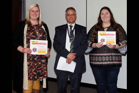 (L to R) Whitney Lyons, 911 Director Brian Hitchcock and Stephanie Nickell Award recipients not pictured are: Amber Zarnke, Carol Evans, Haley Holt, Kerston Abbott and Stanley York.