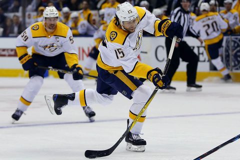 Nashville Predators forward Craig Smith (15) goes to shoot the puck against the Toronto Maple Leafs during the first period at the Air Canada Centre. (John E. Sokolowski-USA TODAY Sports)