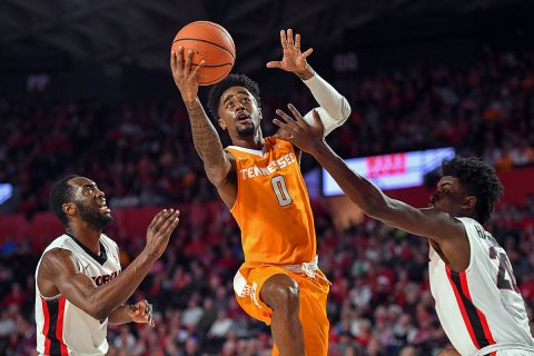 Tennessee Volunteers guard Jordan Bone (0) goes to the basket between Georgia Bulldogs guard William Jackson II (0) and forward Rayshaun Hammonds (20) during the first half at Stegeman Coliseum. (Dale Zanine-USA TODAY Sports)