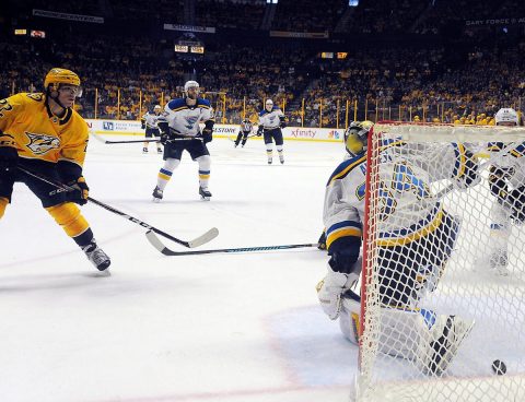 Nashville Predators left wing Kevin Fiala (22) scores past St. Louis Blues goalie Jake Allen (34) during the first period at Bridgestone Arena. (Christopher Hanewinckel-USA TODAY Sports)