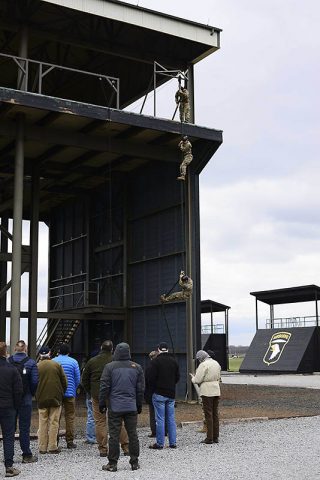 Members of the Business Executives for National Security watch a fast rope demonstration at The Sabalauski Air Assault School, March 7th. (Sgt. Samantha Stoffregen, 101st Airborne Division (Air Assault) Public Affairs)