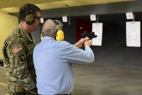 John Morgridge, a member of the Business Executives for National Security and retired chairman of the board for Cisco Systems, Inc. fires a Glock 19, at Range 70, Fort Campbell, Kentucky, March 7th, during his tour of the installation.  Morgridge rappelled off the 34-foot tower at the air assault school, setting the record as the oldest person to do so at the age of 84.  (Sgt. Samantha Stoffregen, 101st Airborne Division (Air Assault) Public Affairs)