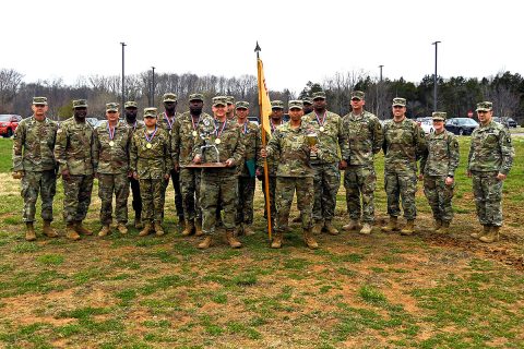 Col. Craig Alia, 101st Combat Aviation Brigade commander, awards a trophy to Soldiers from the 6th General Support Aviation Battalion, 101st CAB March 23, 2018 at Fort Campbell, KY. The Soldiers competed in the 2nd Annual 101st Combat Aviation Brigade Forward Arming and Refueling Point (FARP). (U.S. Army photo by Sgt. Marcus Floyd, 101st Combat Aviation Brigade)