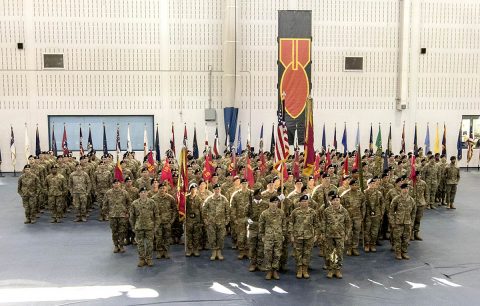 Soldiers of the 52nd Ordnance Group (Explosive Ordnance Disposal), 20th Chemical, Biological, Radiological, Nuclear and high-yield Explosive Command, stand ready before a change of command ceremony in Sabo Physical Fitness Center on Fort Campbell, Ky., Mar. 14, 2018. This ceremony allowed the group to honor its outgoing commander, Col. Mark R. Faria, and welcome its new commander, Col. Daniel J. Duncan. (U.S. Army photo by Staff Sgt. Adam Hinman, 52nd Ordnance Group) 