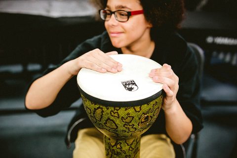 Clarksville-Montgomery County School System student playing drum. 