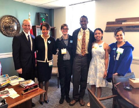 (L to R) State Representative Joe Pitts, Candy Johnson and a group of students from Christian Brothers University